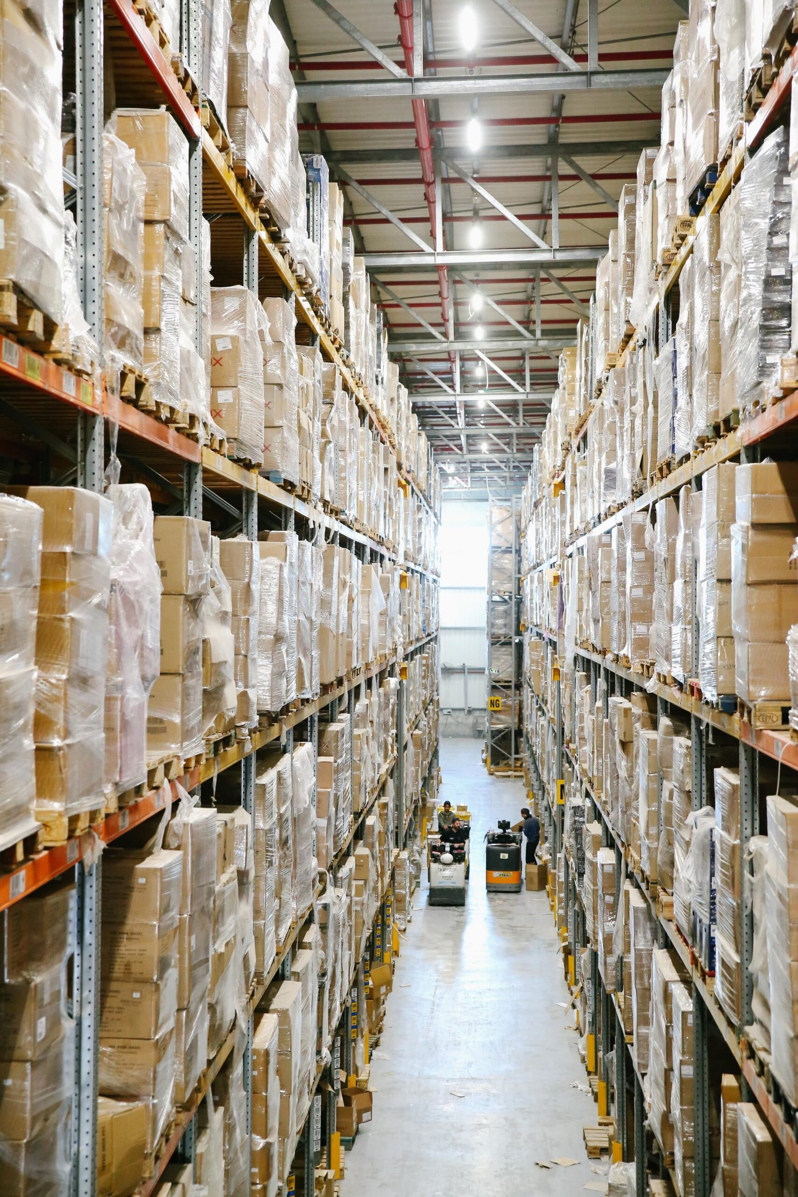 Warehouse shelves with packed boxes for India INR 99 store wholesale order planning