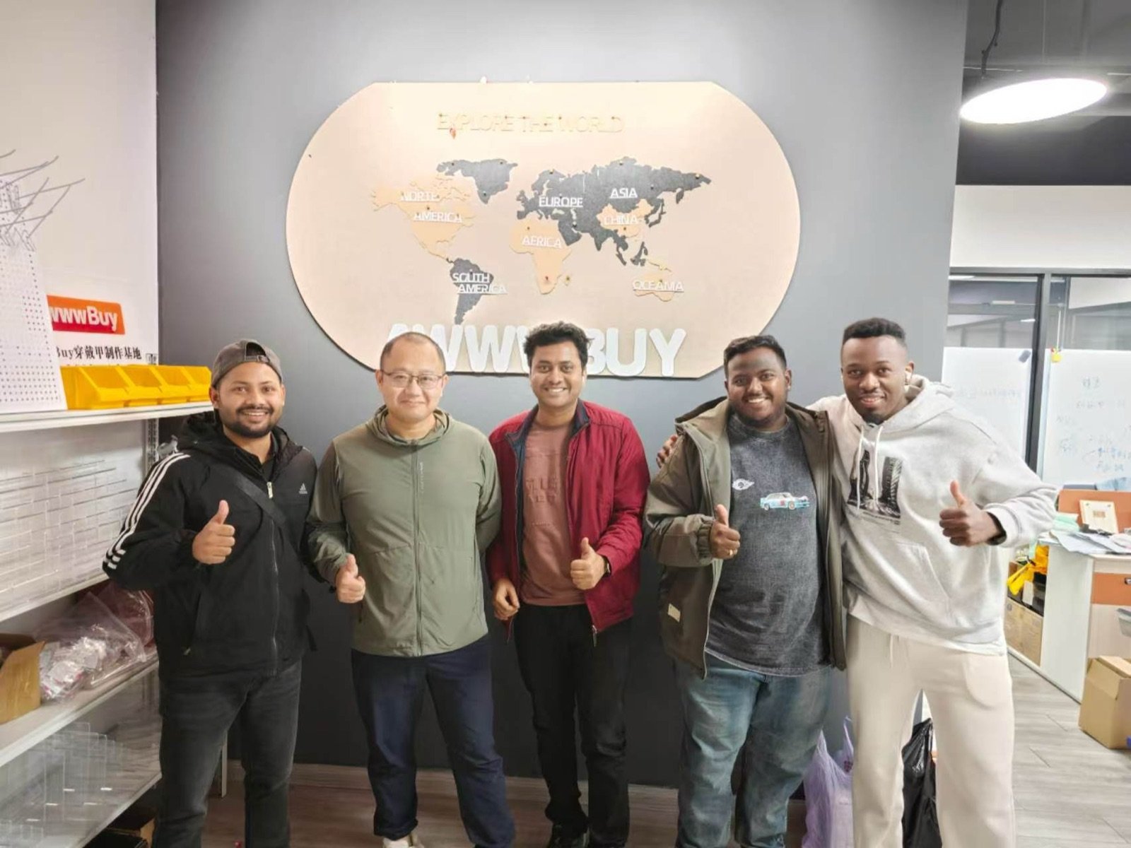 Customers and AwwwStore team group photo