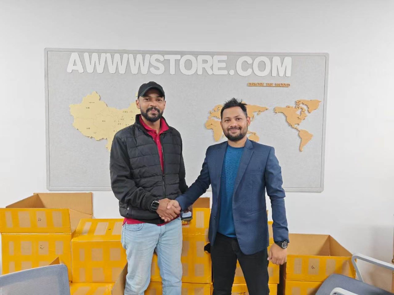AwwwStore partners shaking hands after agreeing a store supply plan